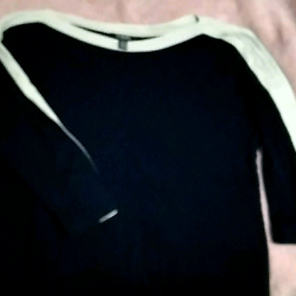 Long navy blue a white long sleeve shirt.